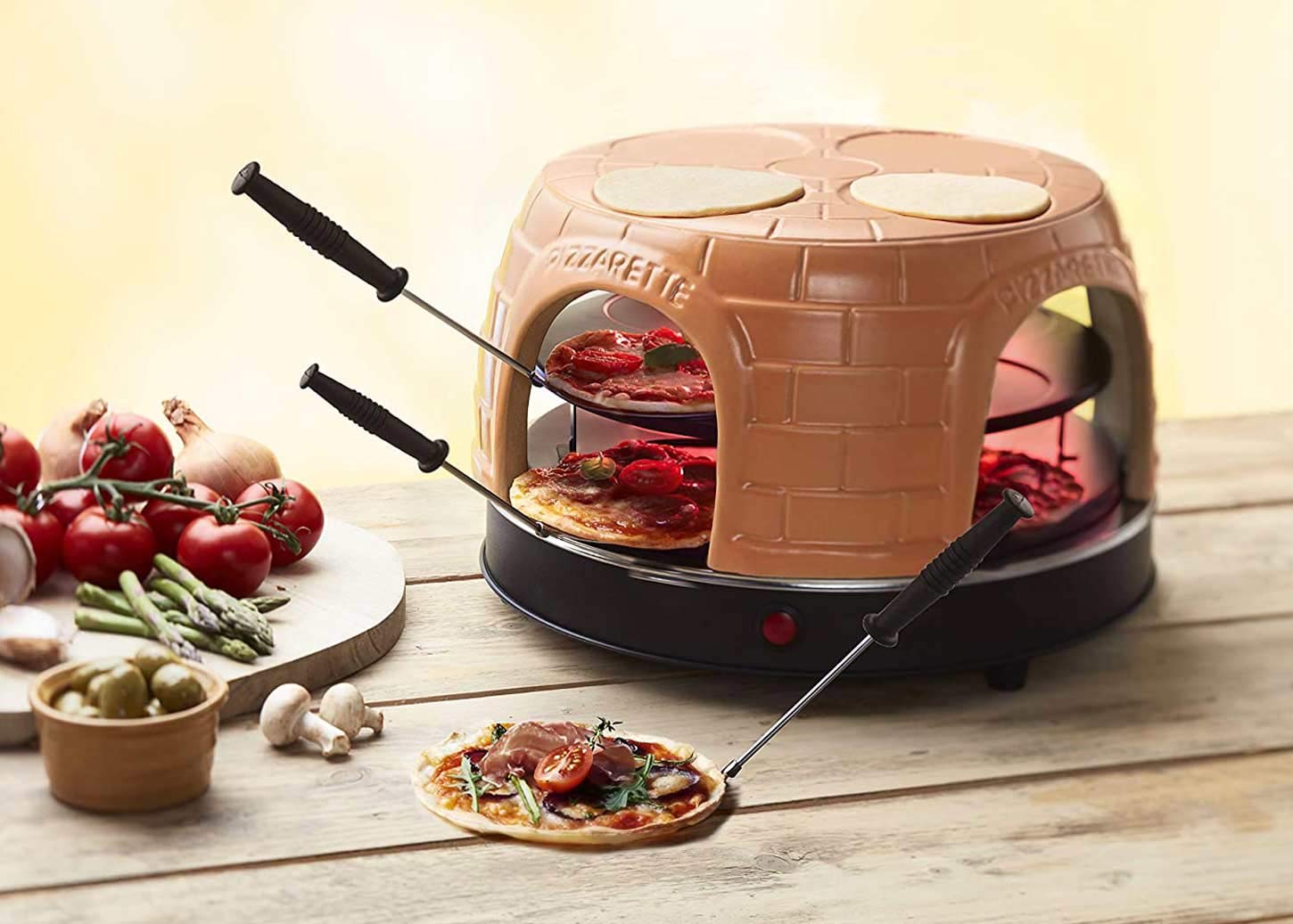 Emerio Pizzarette PO-116124.1 - Picas cepeškrāsns ar terrakota kupolu līdz 8 personām, 1500W, rozā krāsā